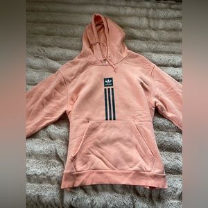 peach adidas hoodie from pacsun